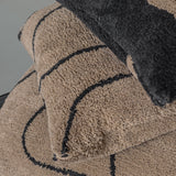 FIGURA tufted cushion cover in brown, Mette Ditmer