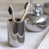 LOTUS toothbrush holder in chrome, Mette Ditmer