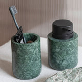 MARBLE low dispenser in dark forest, Mette Ditmer