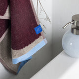 NOVA ARTE towel in wine / sand, Mette Ditmer